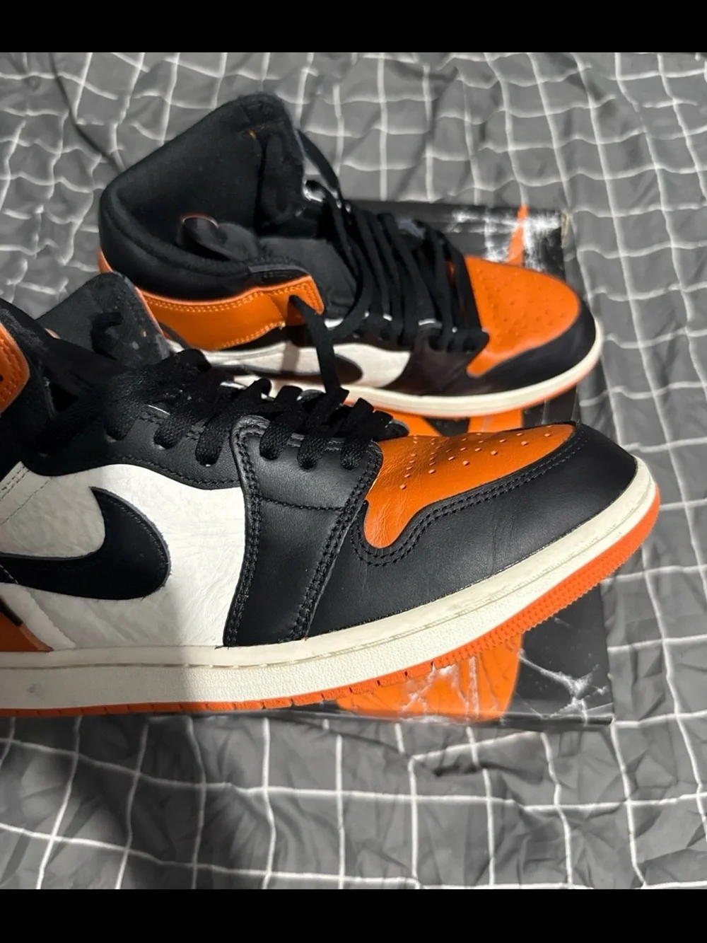 Nike Men’s Black and Orange High-Top Sneakers